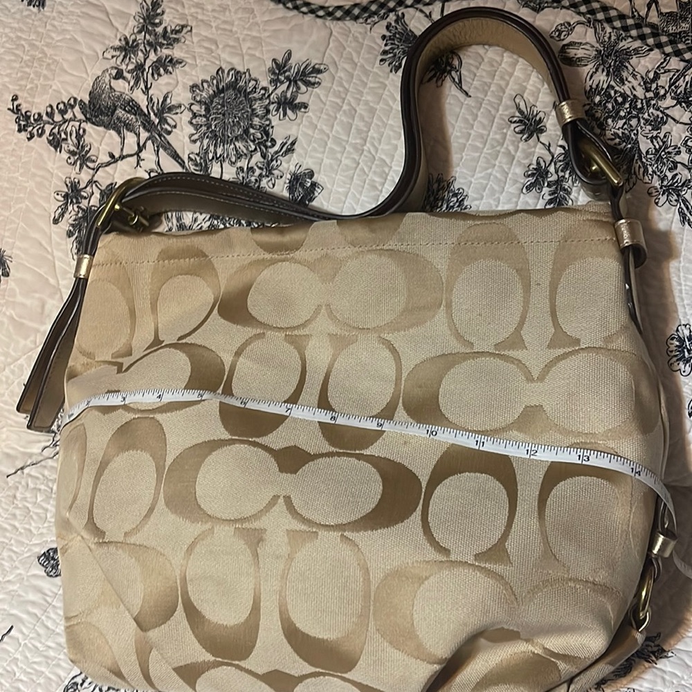 Golden brown Authentic Coach signature purse